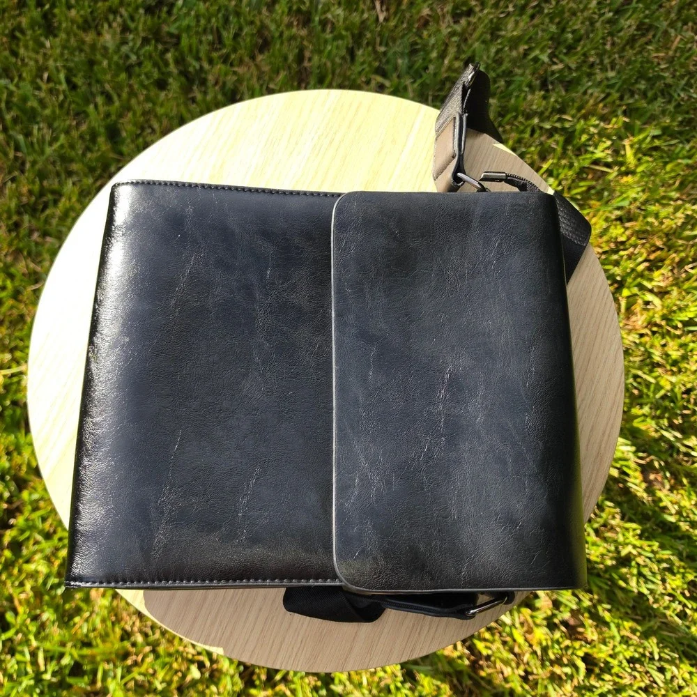 Gucci Black Embossed Logo Messenger Bag Crossbody Faux Leather Adjustable Strap